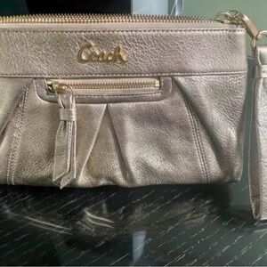 Coach clutch wristlet rose gold metallic purse handbag